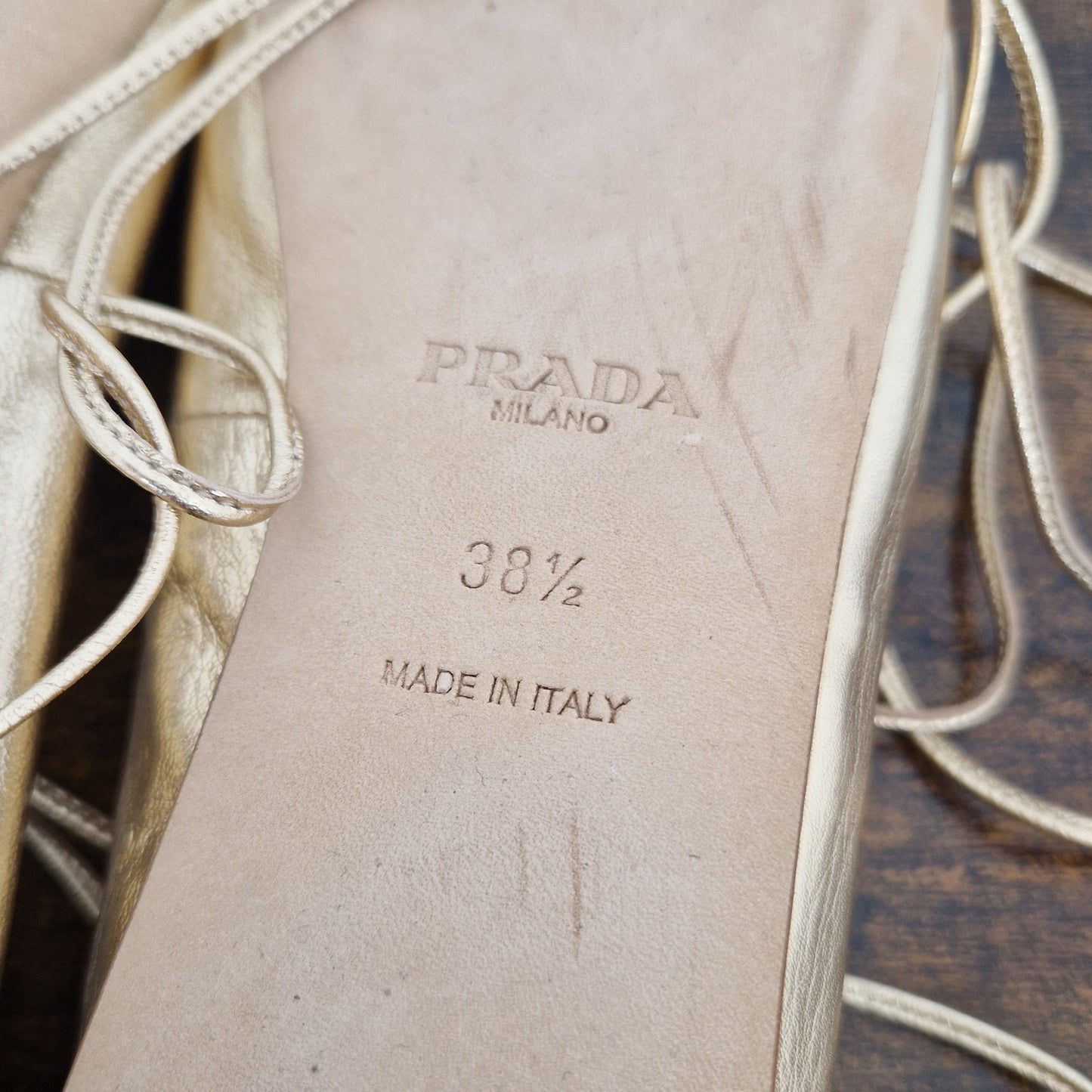 Prada | Ballerine con lacci pelle oro
