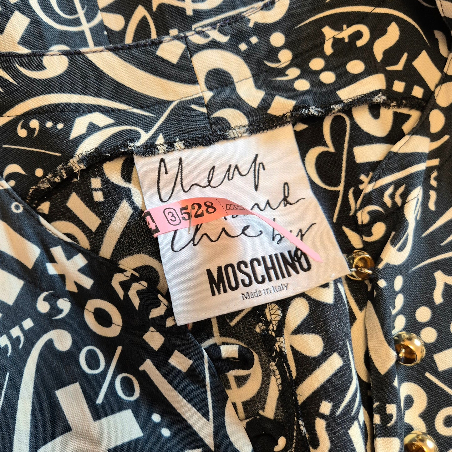 Moschino | Abito stampa "Simboli" con bottoncini dorati