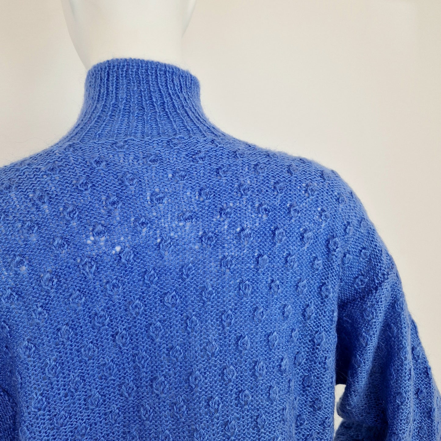 Maglione turchese collo alto