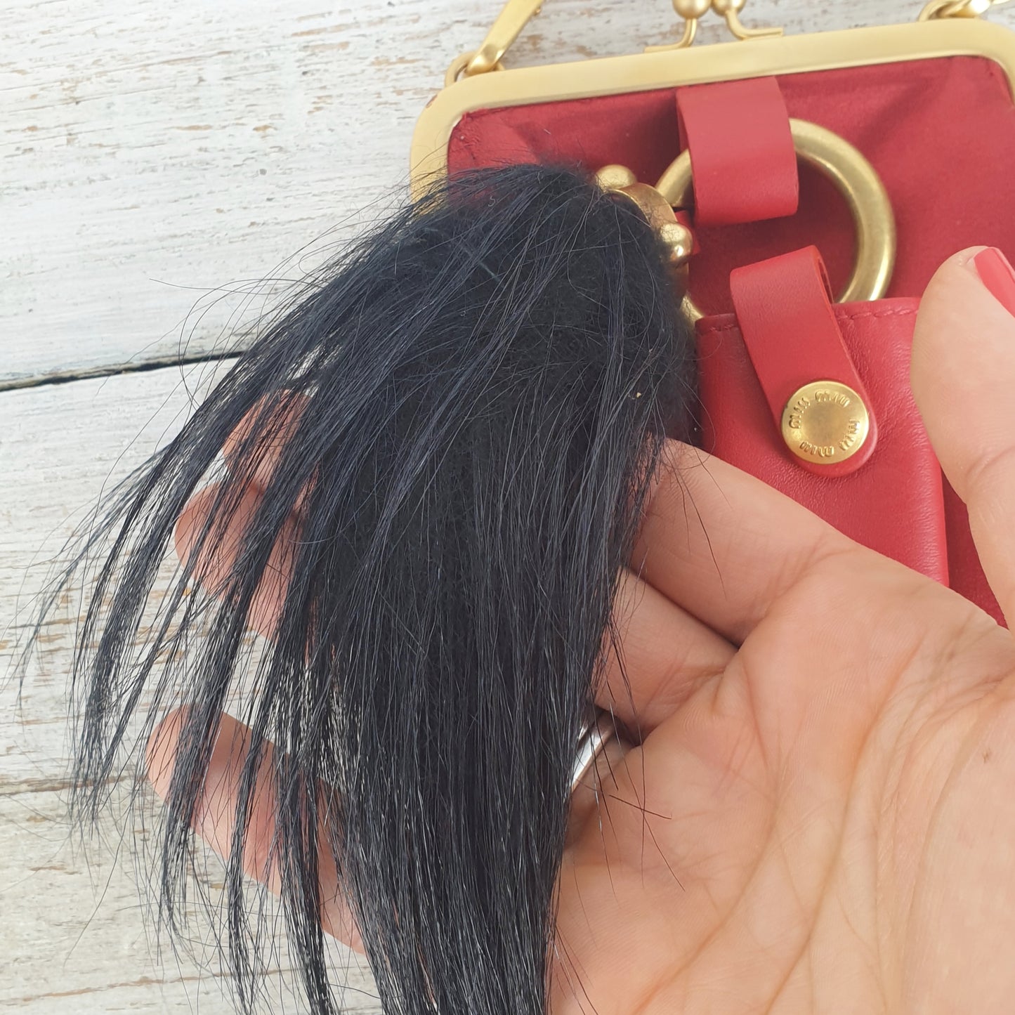 Micro bag Miu Miu rossa in raso e pelle
