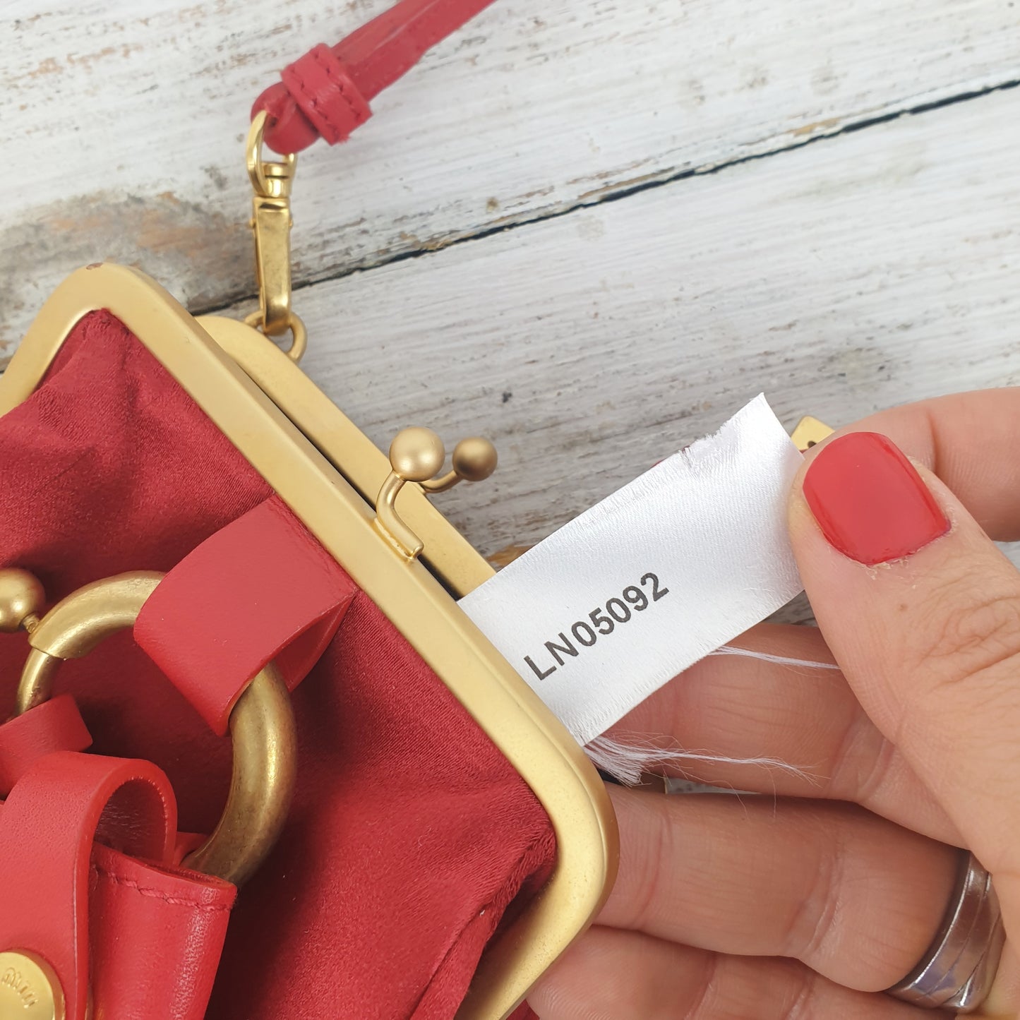 Micro bag Miu Miu rossa in raso e pelle