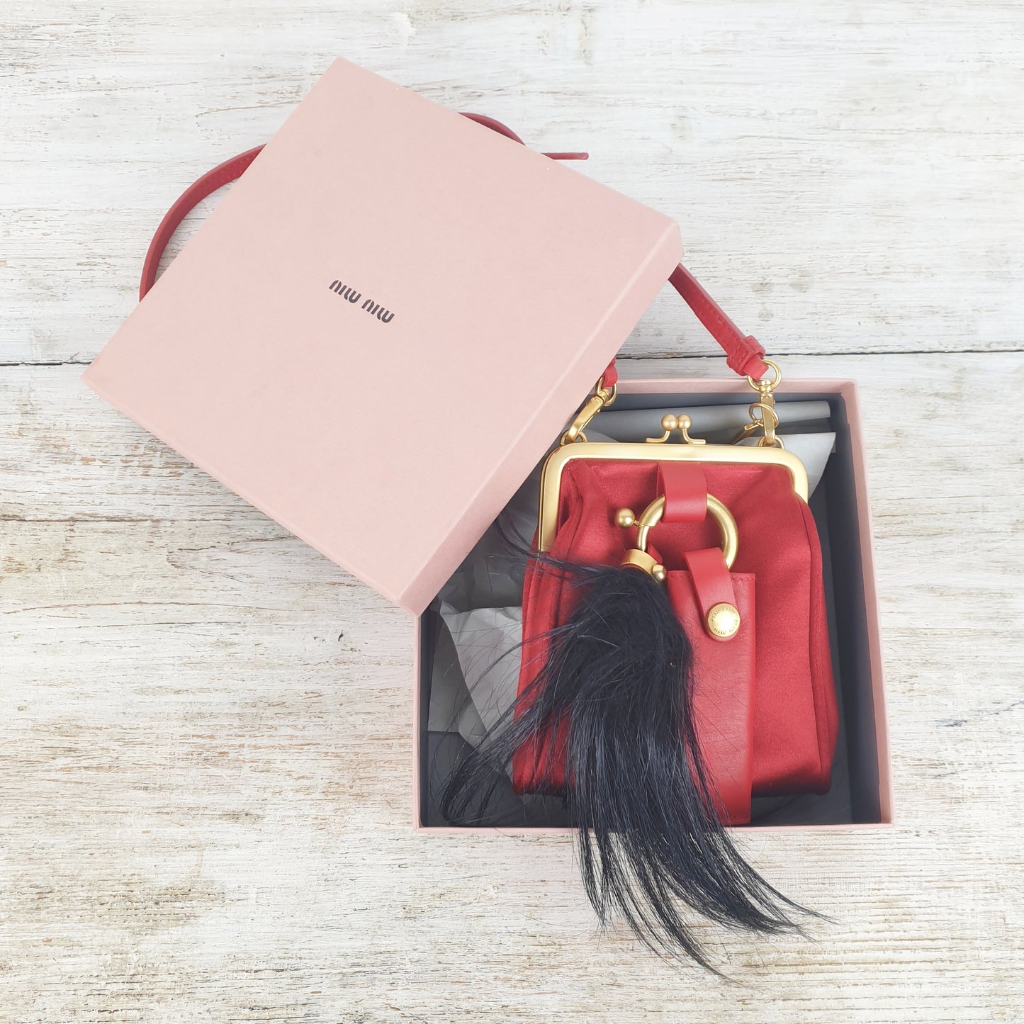 Micro bag Miu Miu rossa in raso e pelle