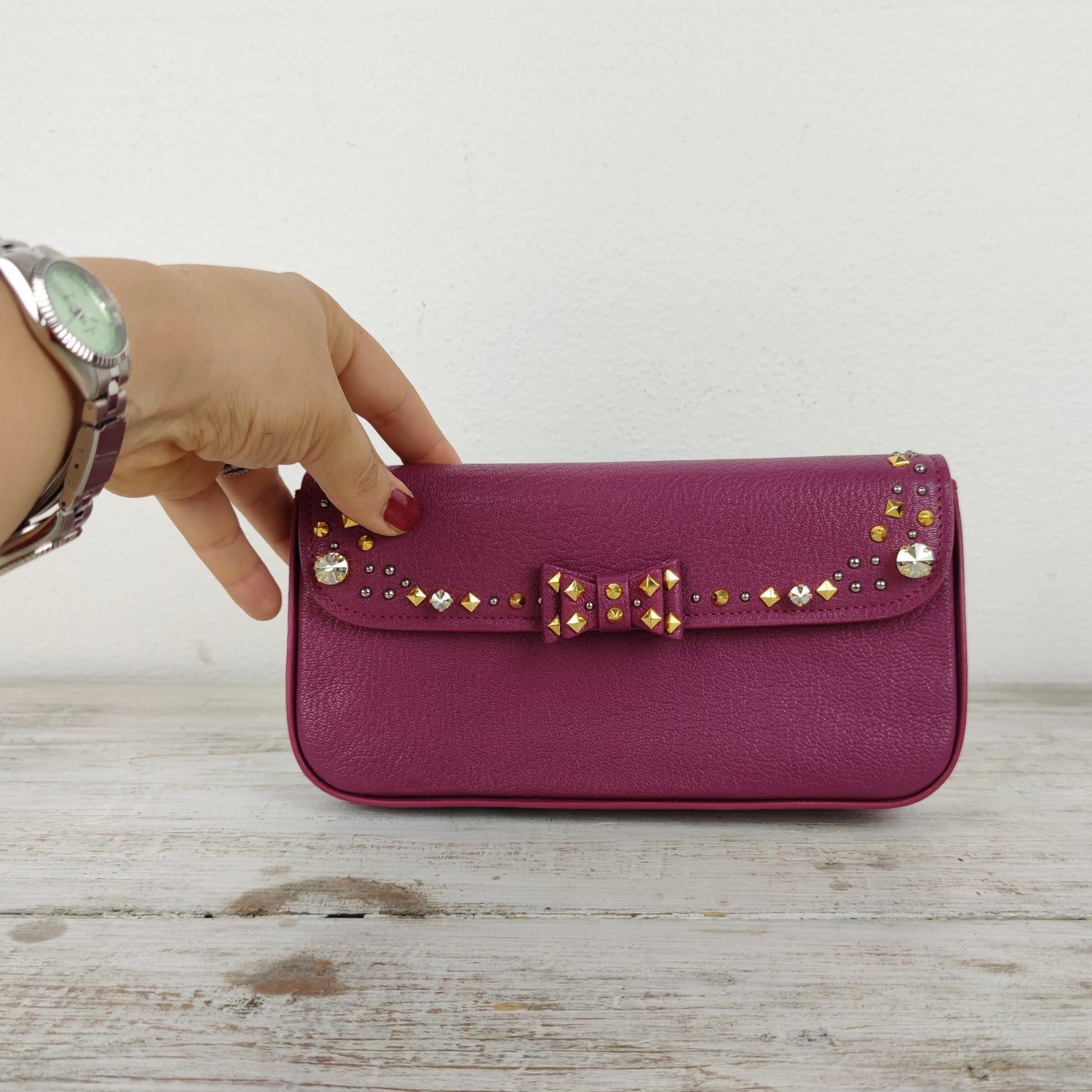 Pochette MiuMiu pelle ciclamino e strass
