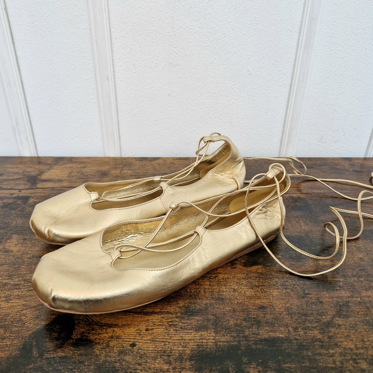 Prada | Ballerine con lacci pelle oro