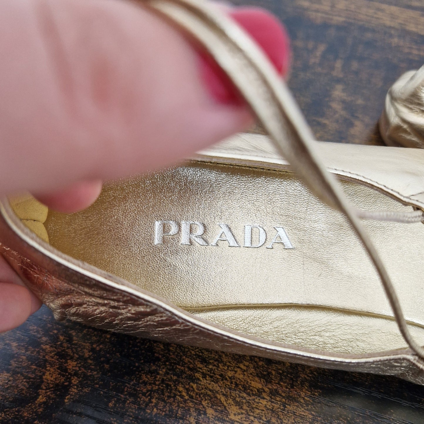 Prada | Ballerine con lacci pelle oro