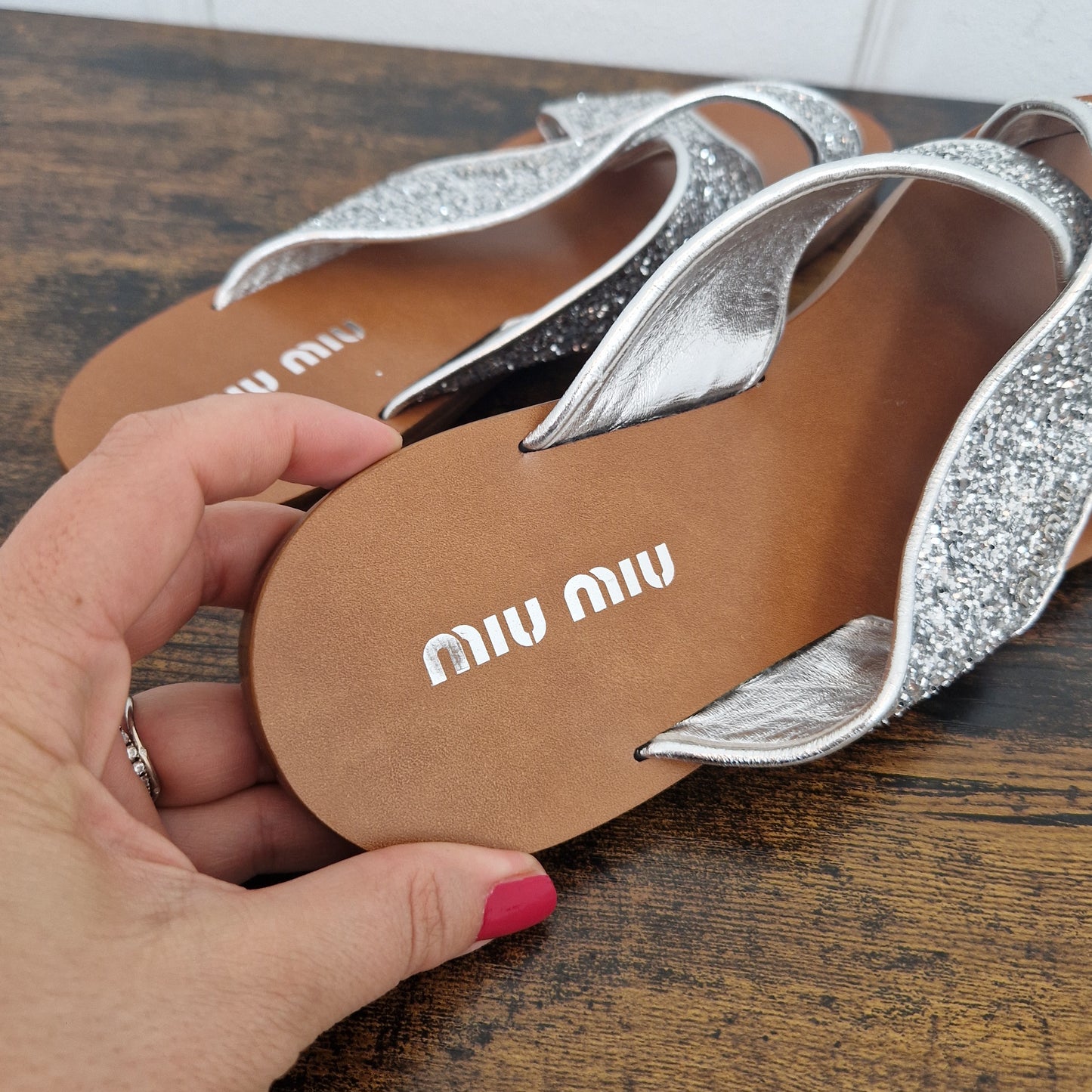 Miu Miu | Ciabatte glitter con incrocio