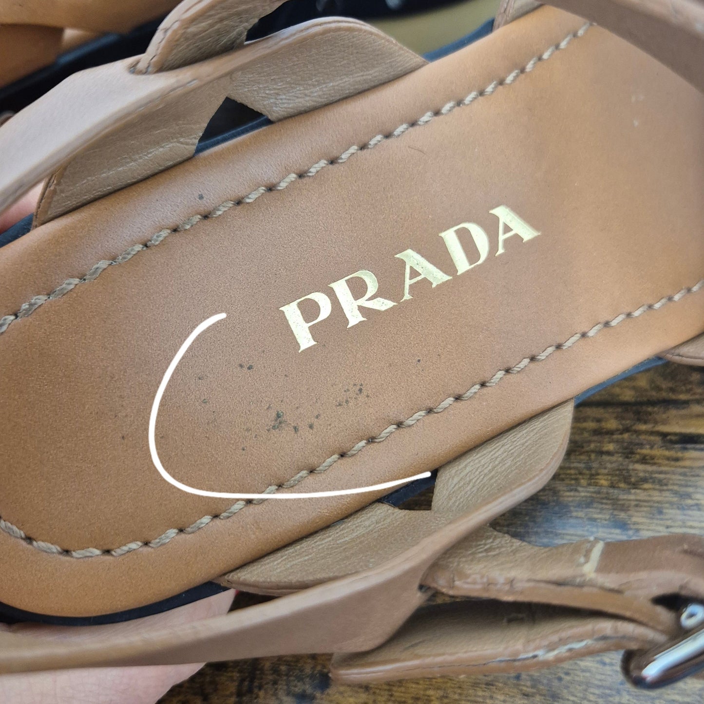 Prada | Zoccoli in pelle e legno