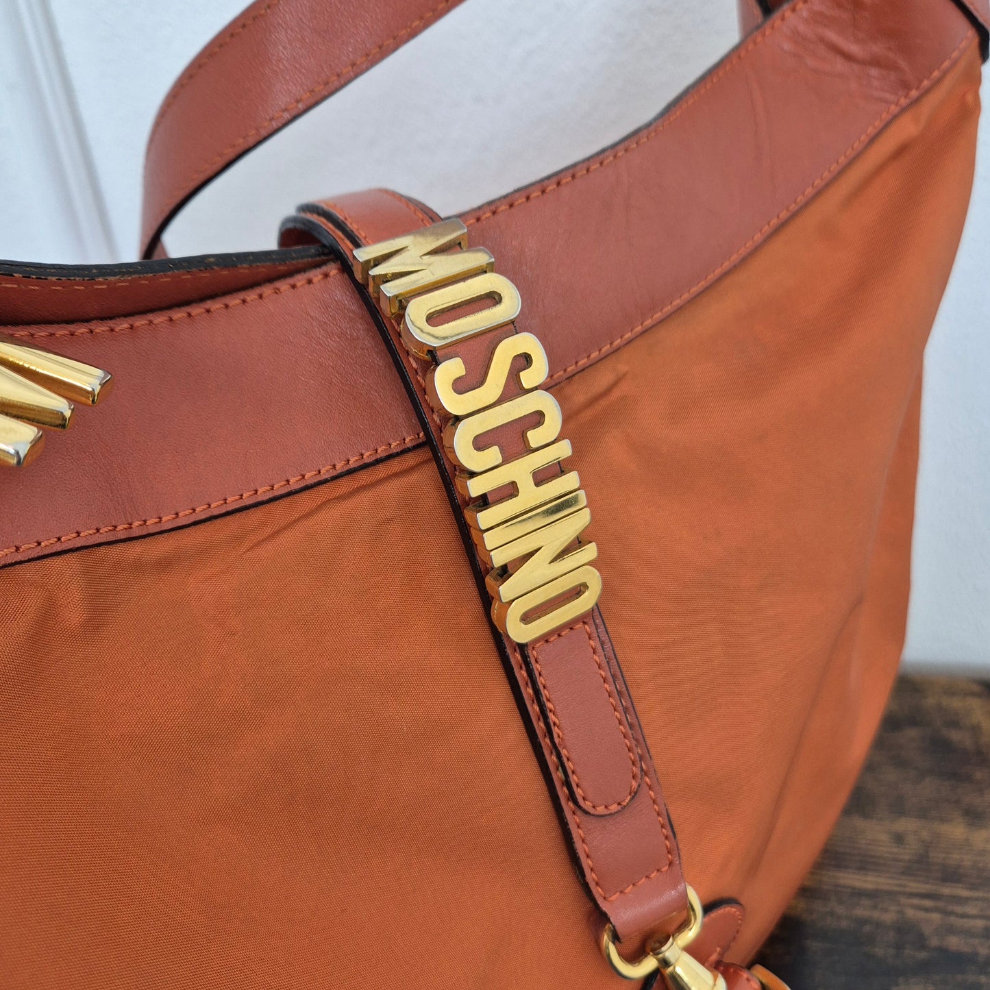 Moschino | Borsa arancio tessuto e pelle