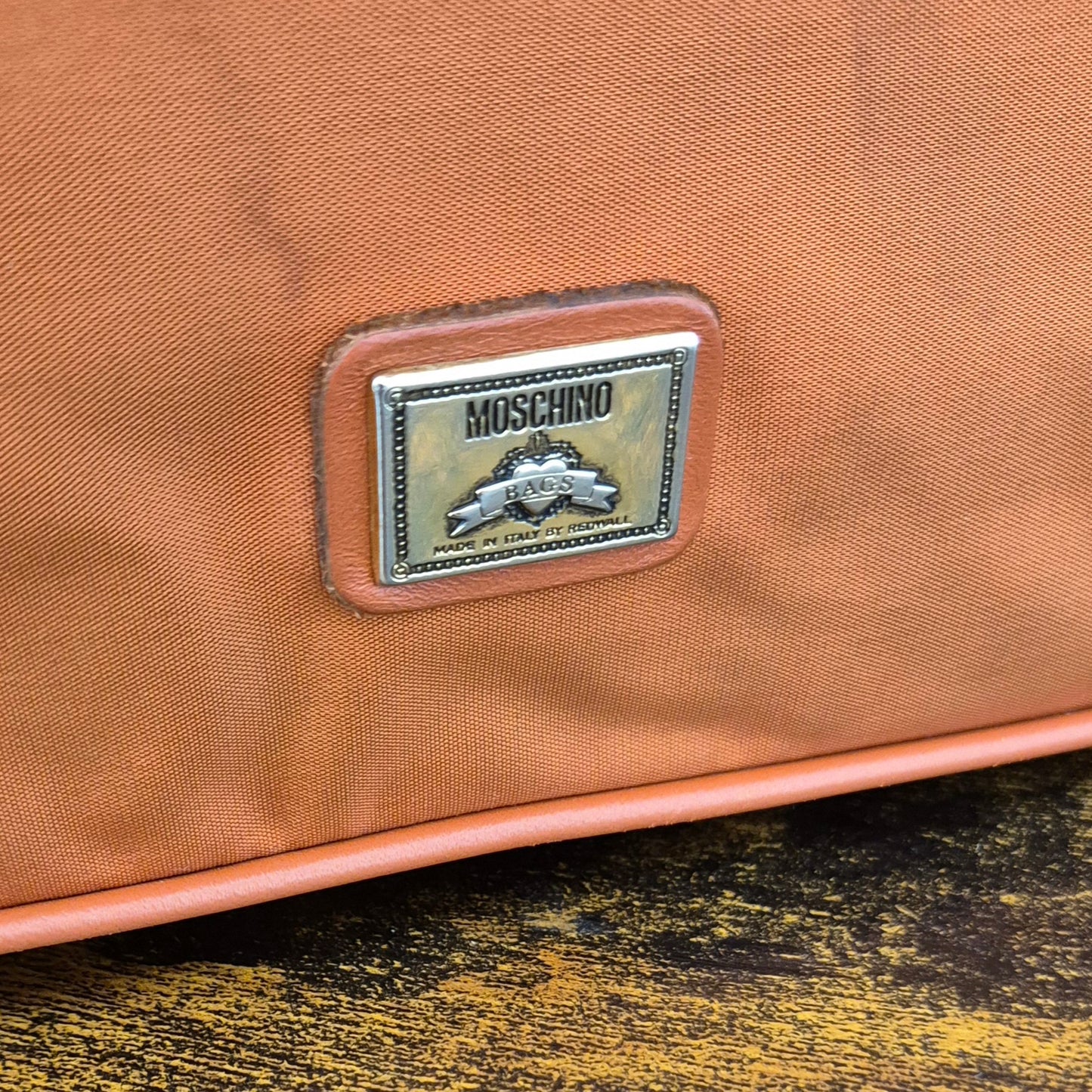 Moschino | Borsa arancio tessuto e pelle