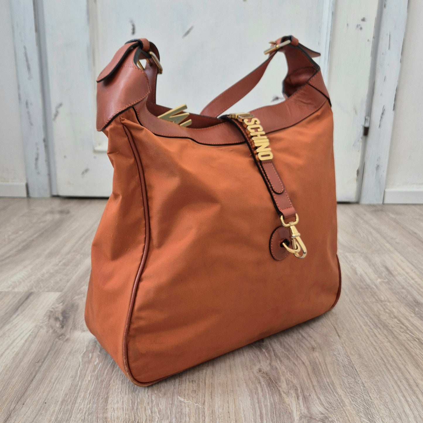 Moschino | Borsa arancio tessuto e pelle