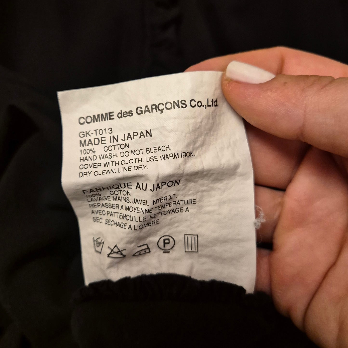 Comme des Garçons | Top asimmetrico in cotone nero