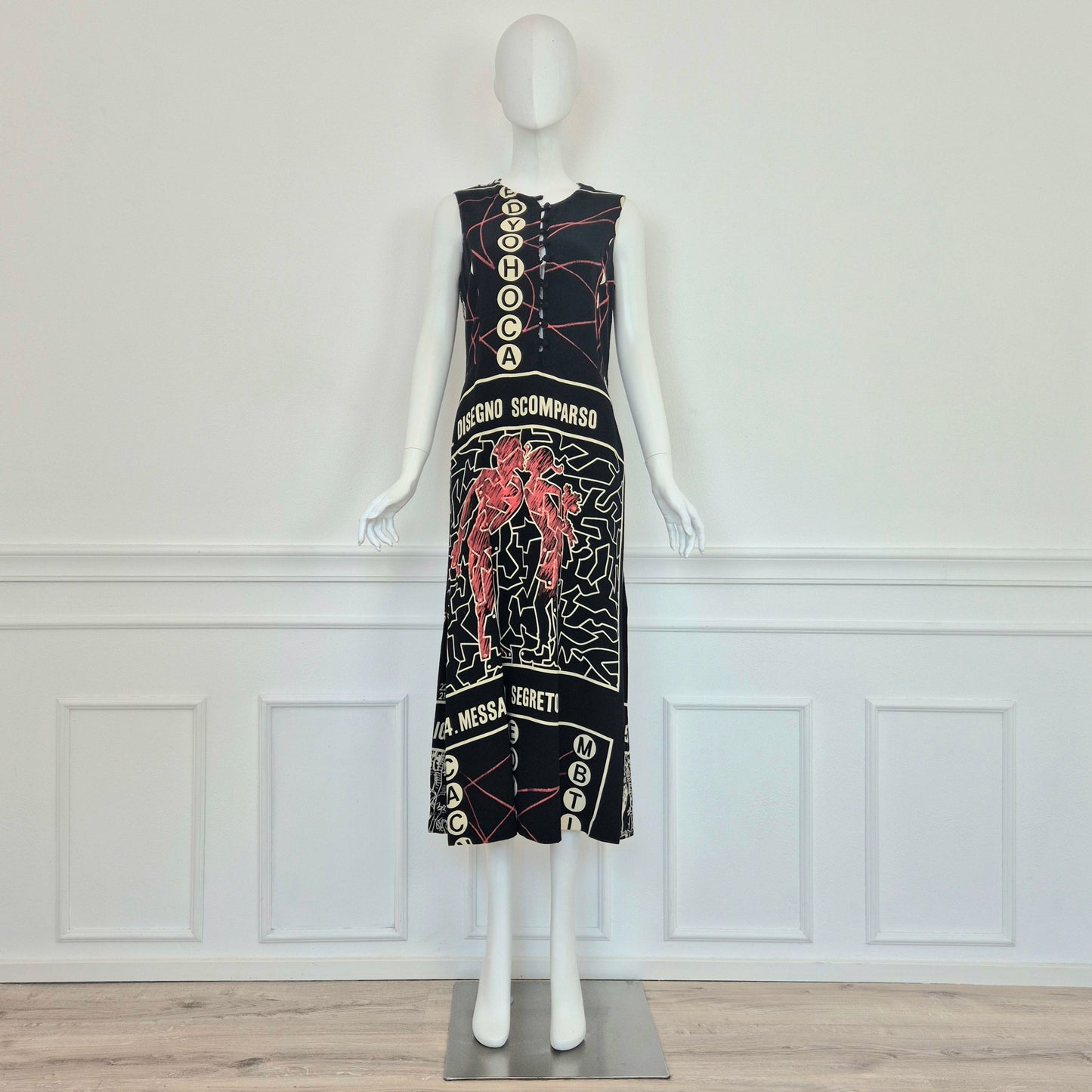 Moschino | Abito "disegno scomparso"- rebus - enigmistica