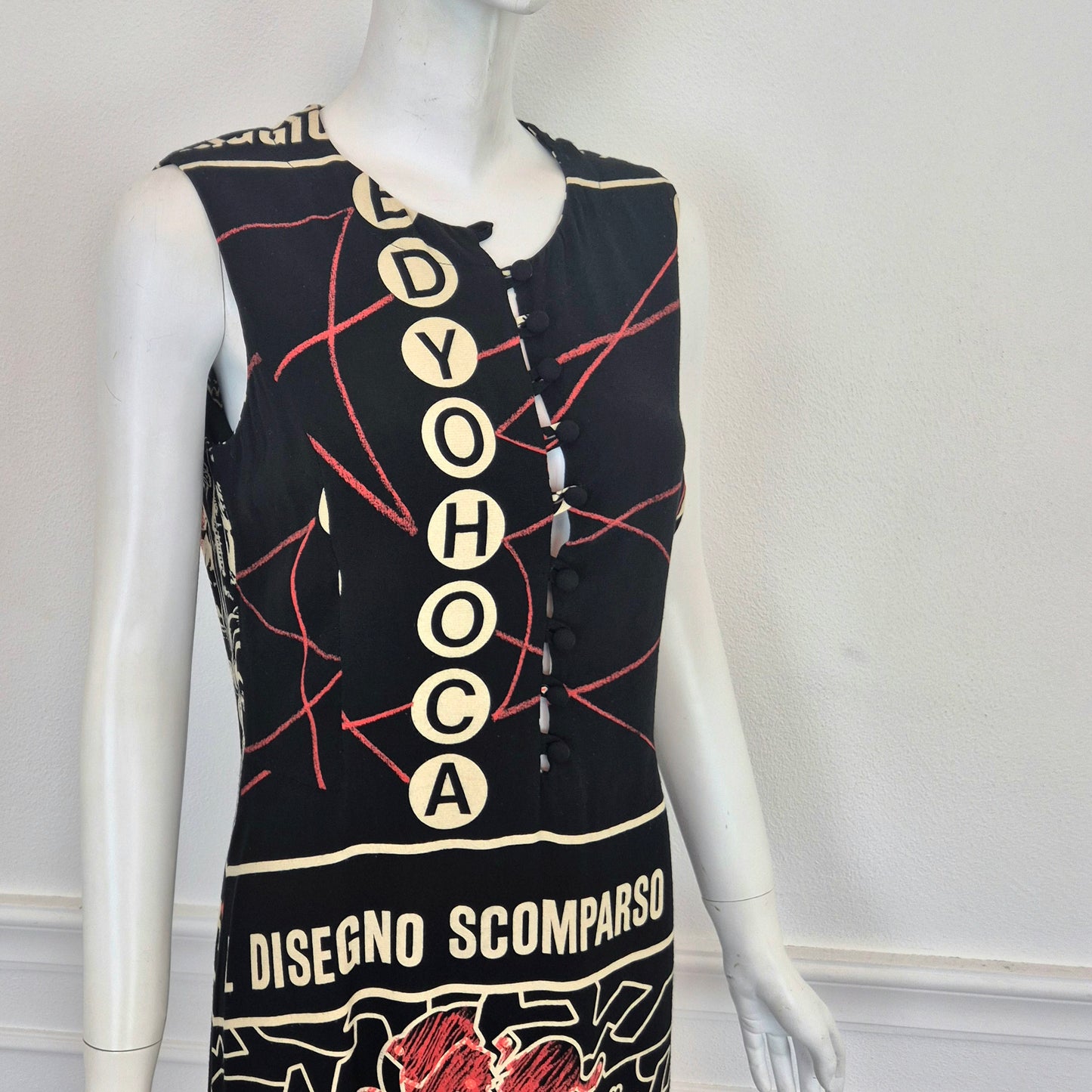 Moschino | Abito "disegno scomparso"- rebus - enigmistica