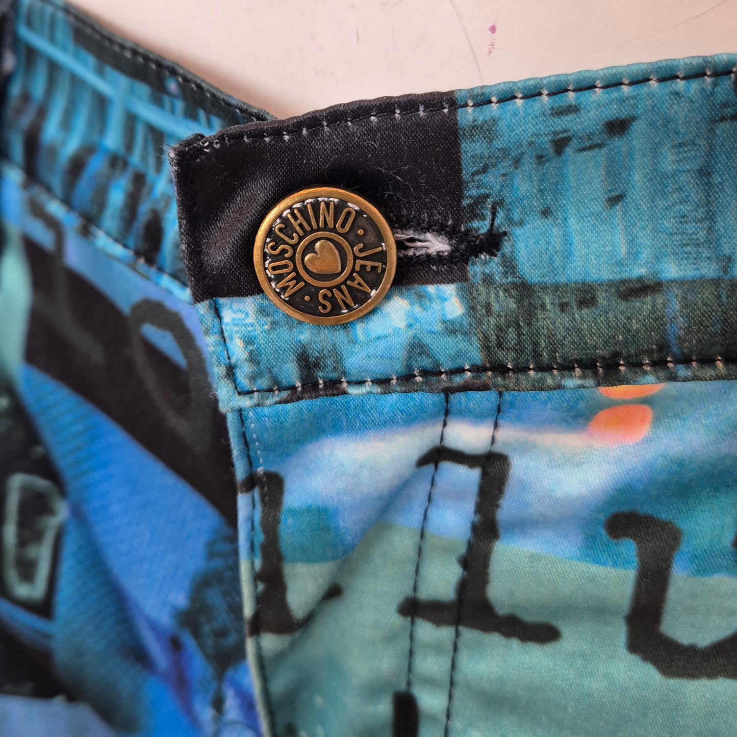 Moschino | Pantaloni stampa speed / future / communication