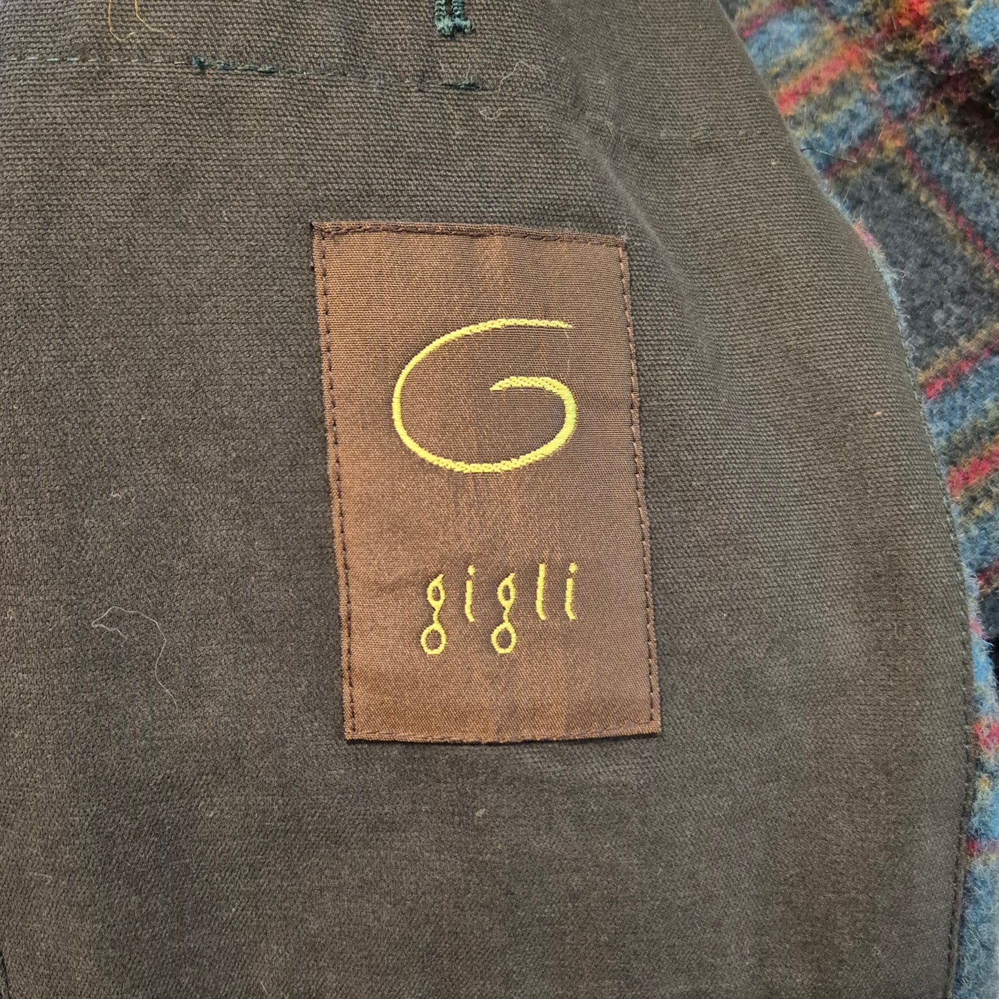 Romeo Gigli | Giaccone verde con interno scozzese e collo in pelo