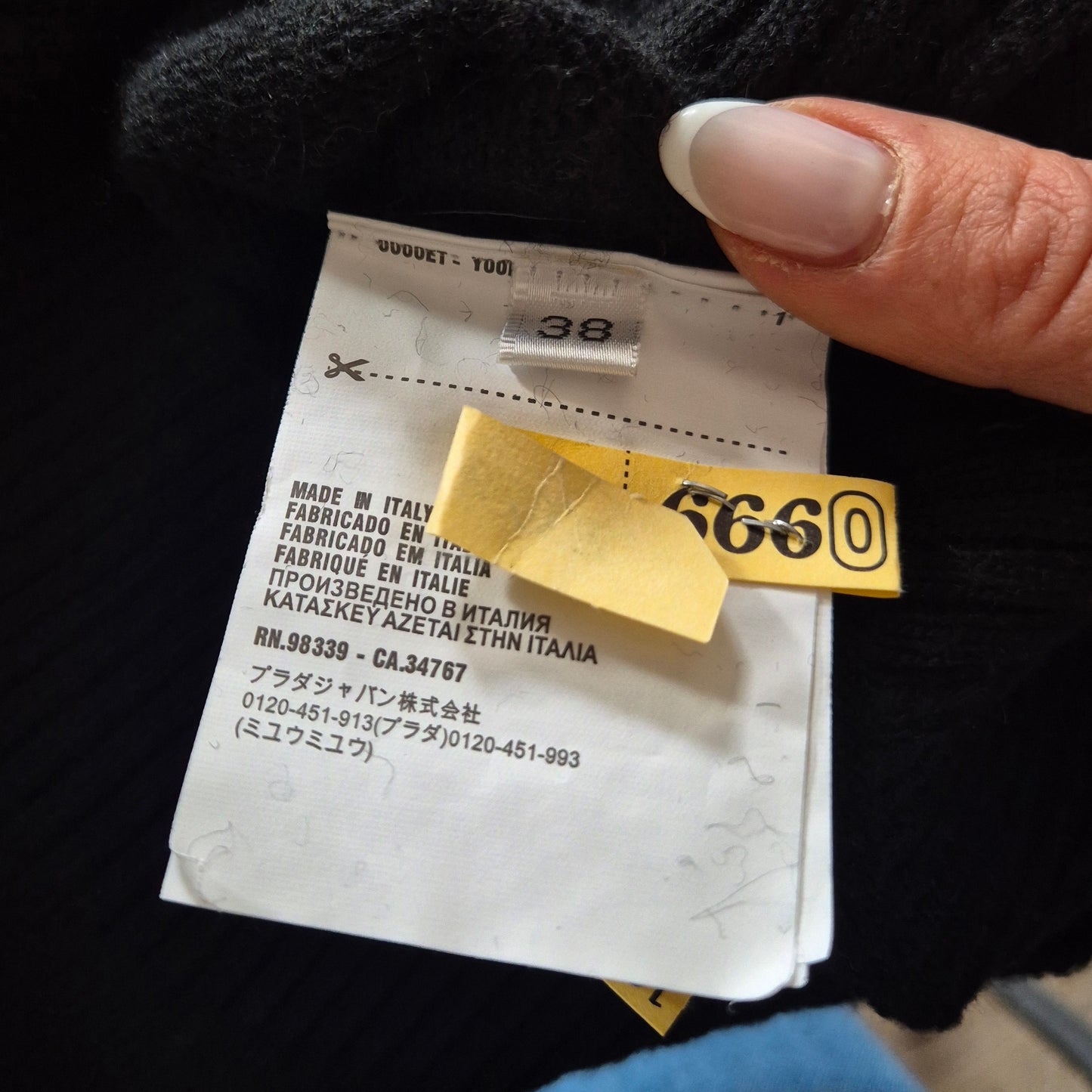 Miu Miu | Maglione nero cropped con logo