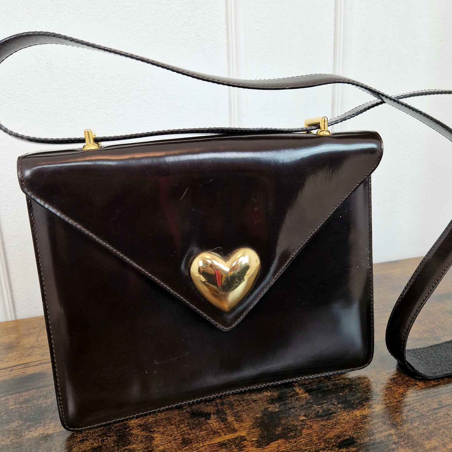 Borsa Moschino testa di moro con cuore oro