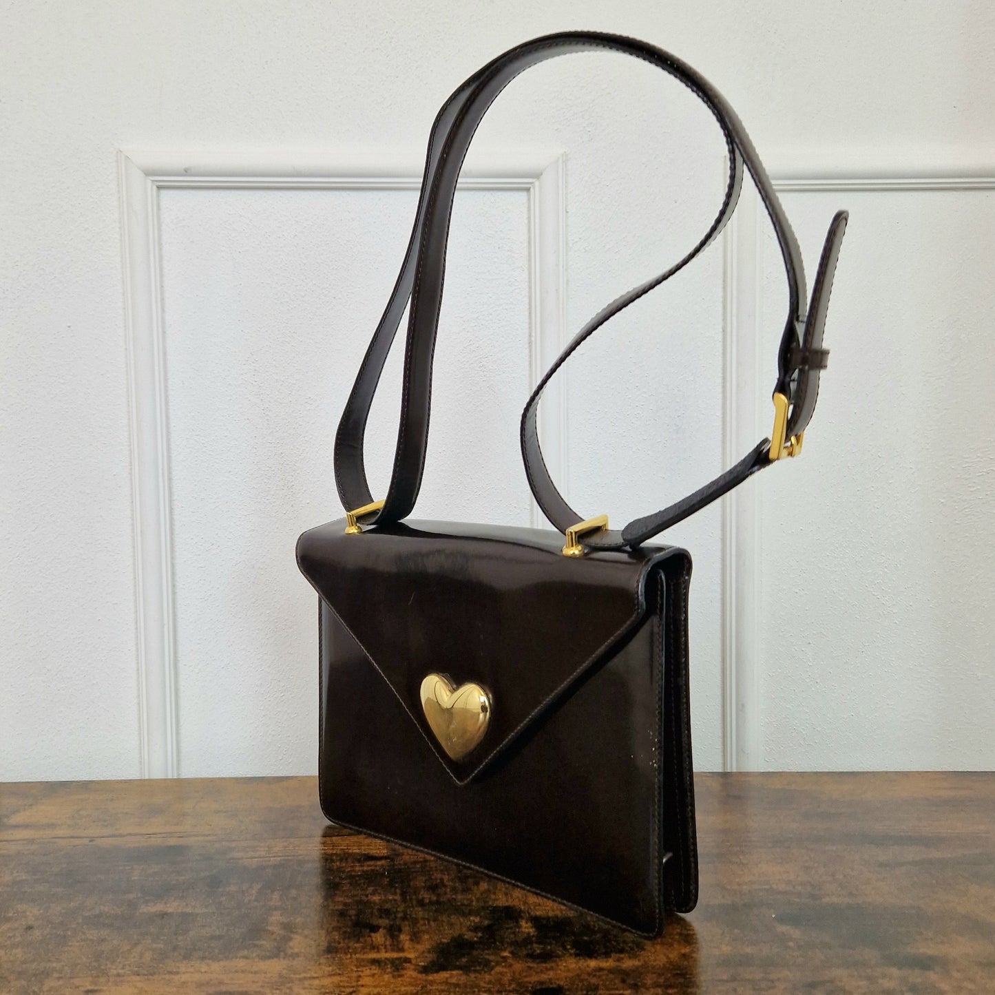 Borsa Moschino testa di moro con cuore oro