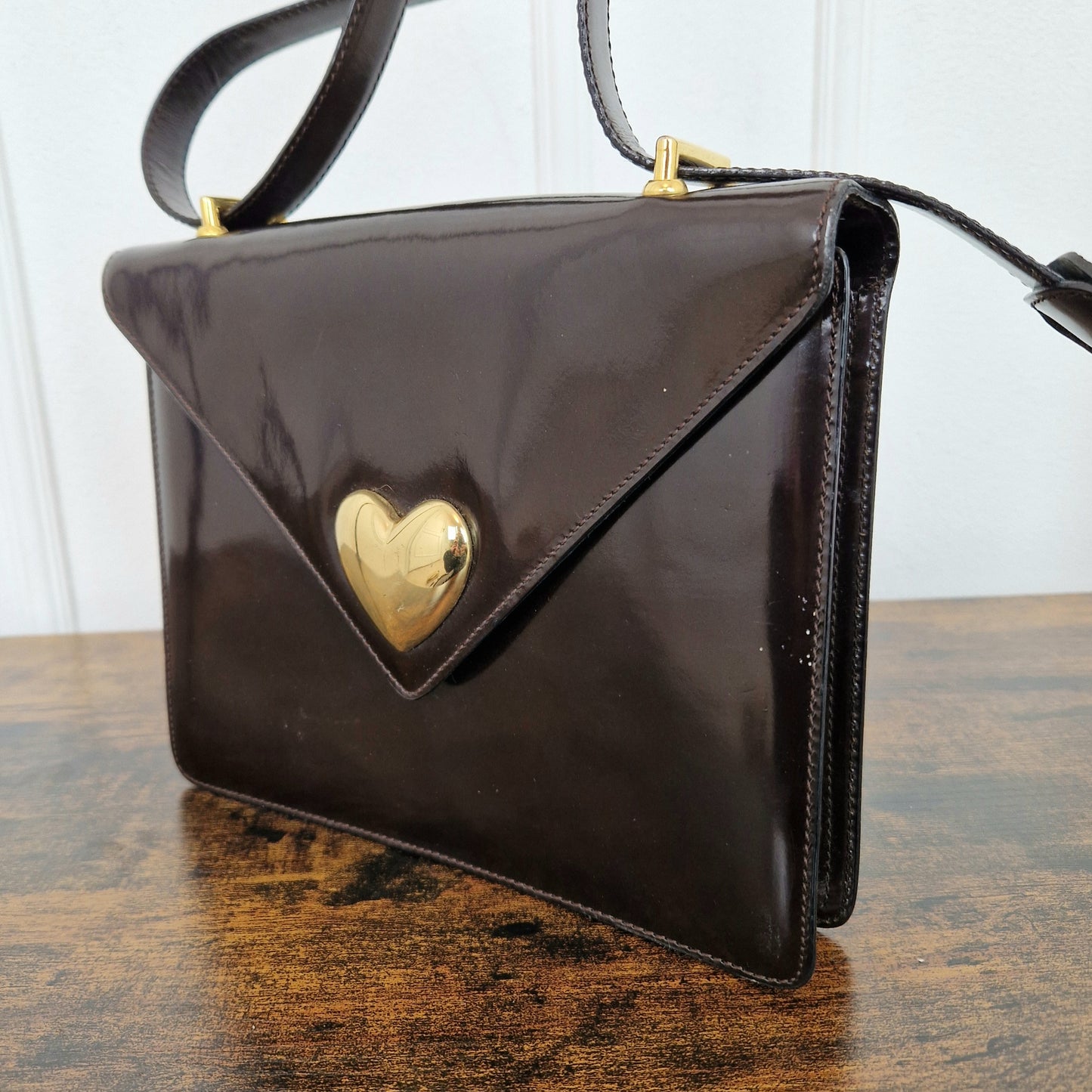 Borsa Moschino testa di moro con cuore oro