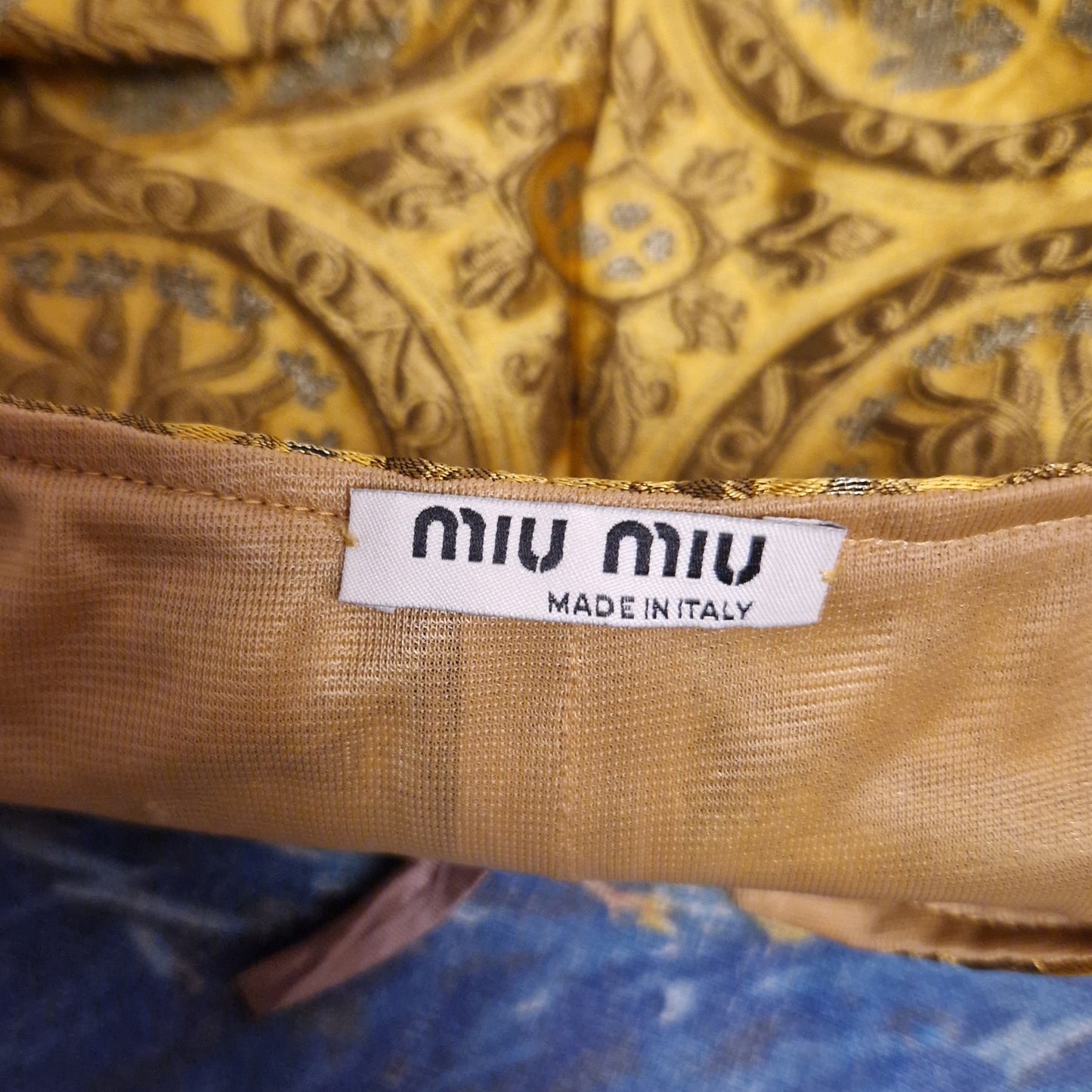 Shorts Miu Miu oro