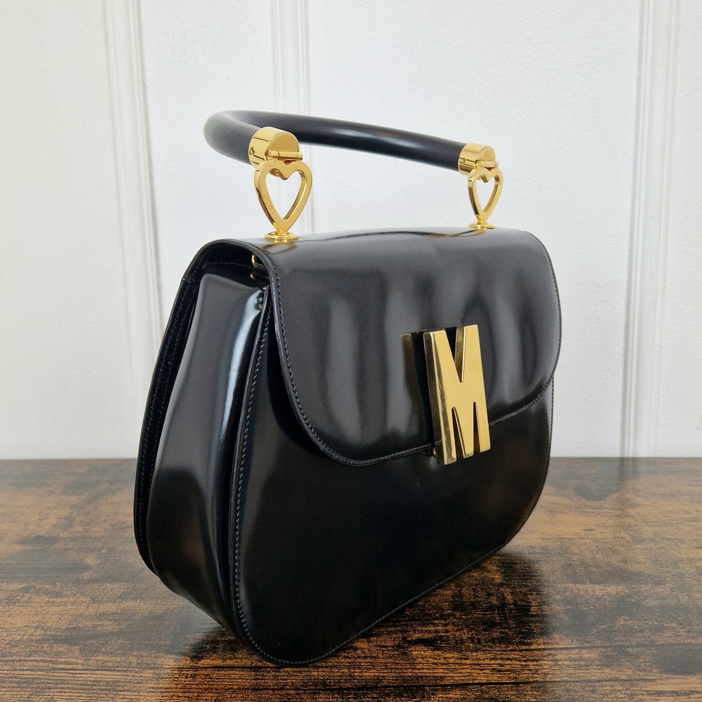 Borsa Moschino redwall nera M oro