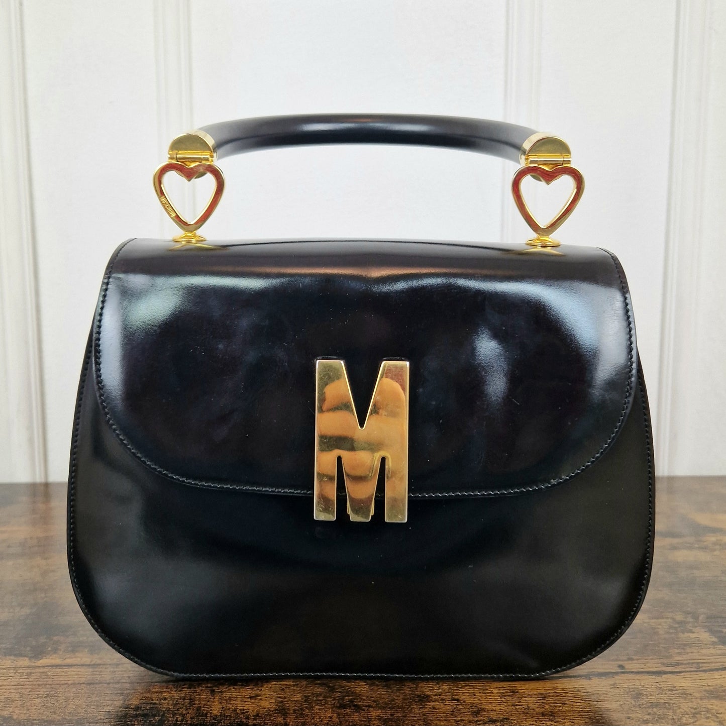 Borsa Moschino redwall nera M oro