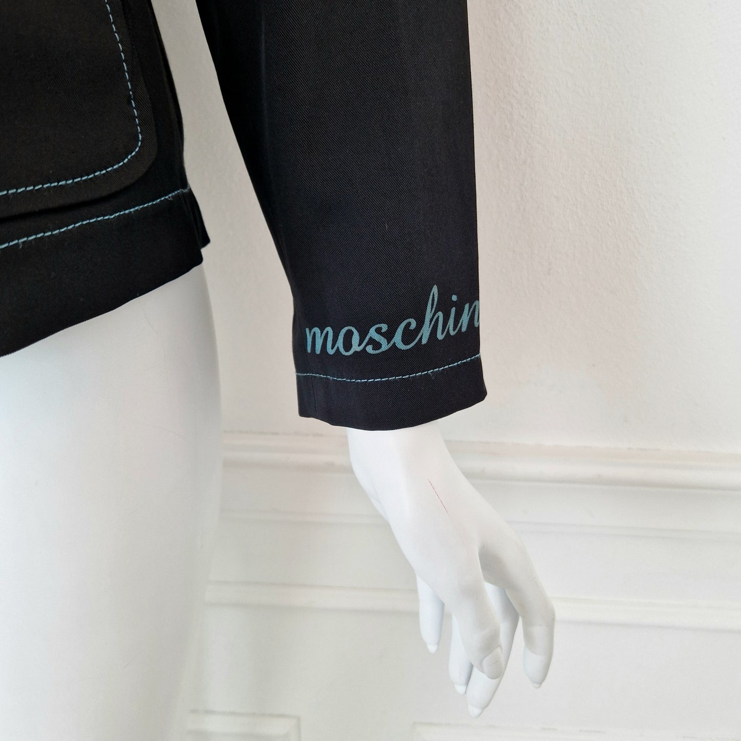 Giacca Moschino scritte azzurre