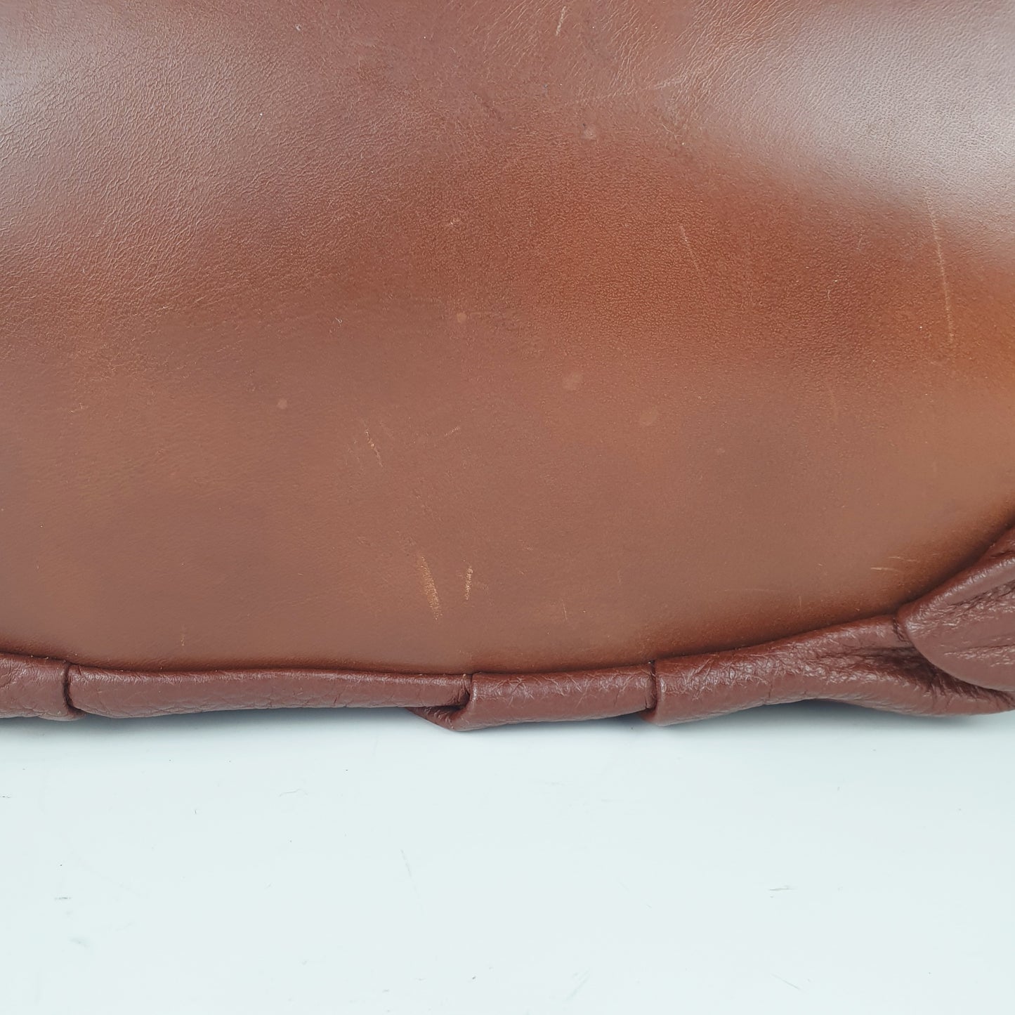 Borsa in pelle marrone con manico intrecciato