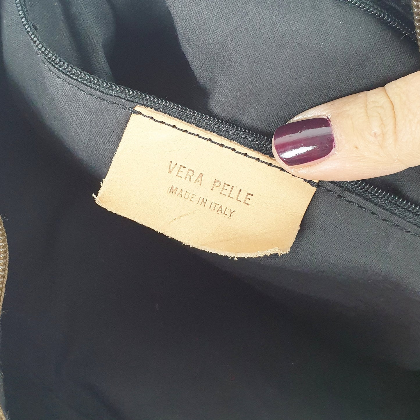 Borsa in pelle marrone con manico intrecciato