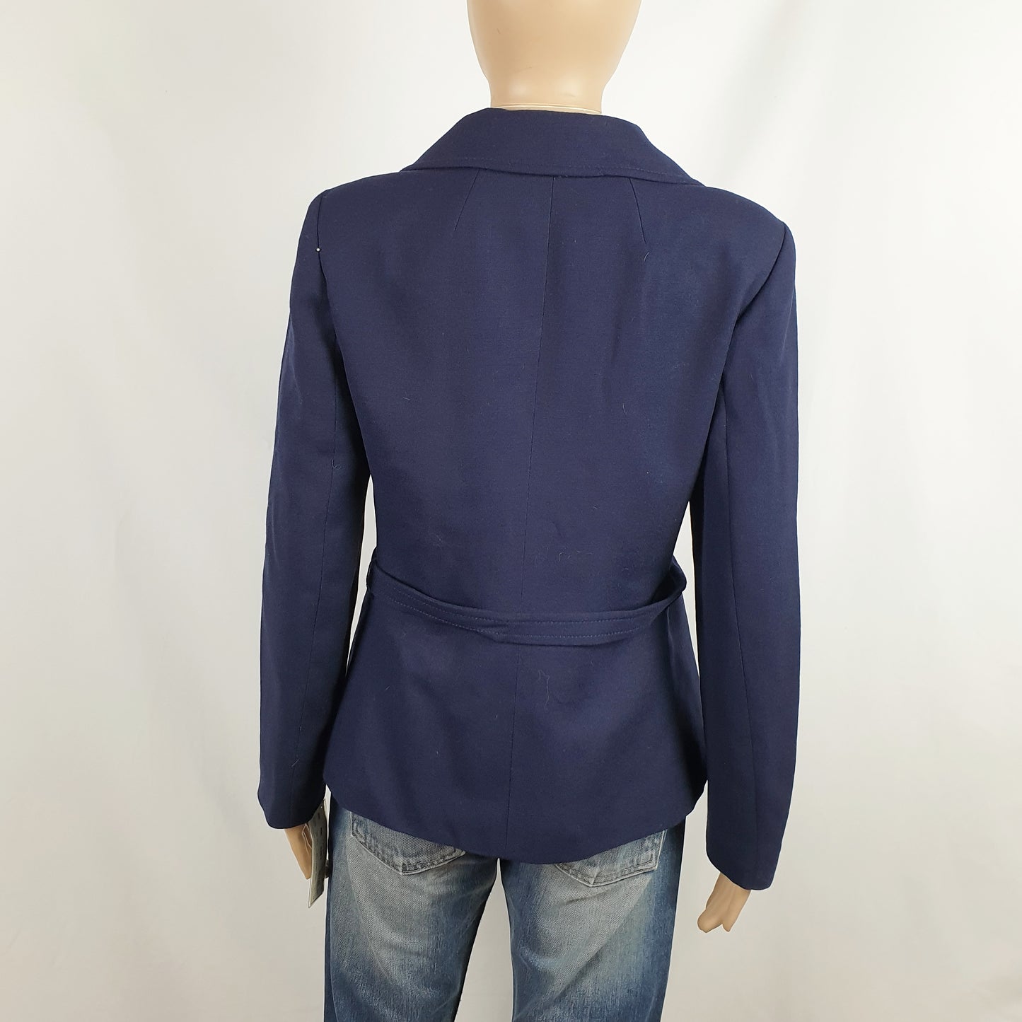Giacca blu con bottoni e fibbia smaltati