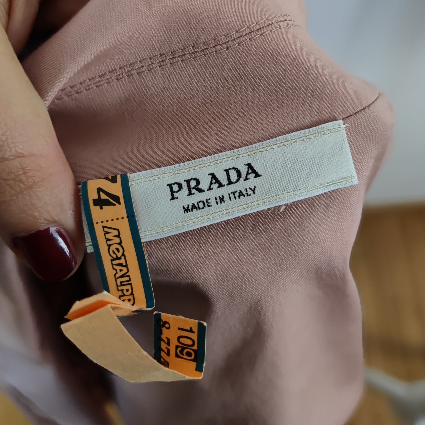 Blazer Prada rosa cipria con fiocco