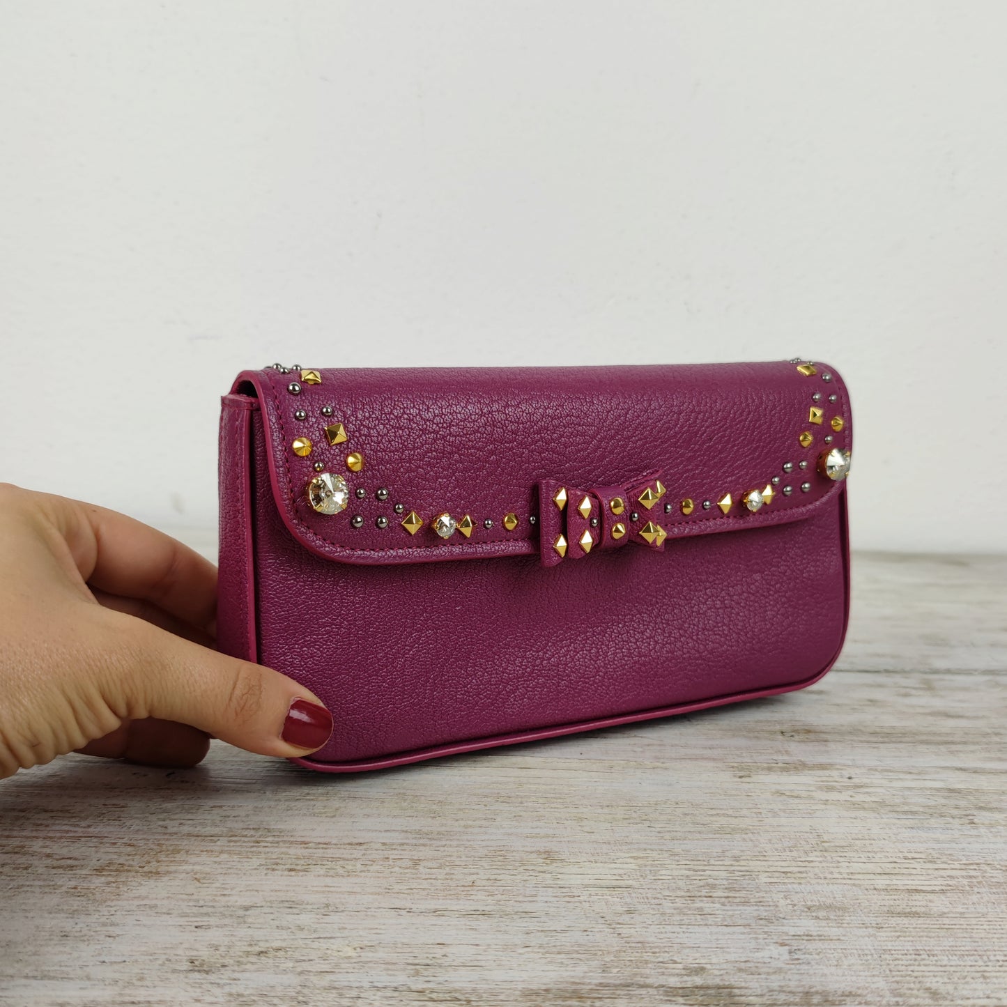 Pochette MiuMiu pelle ciclamino e strass