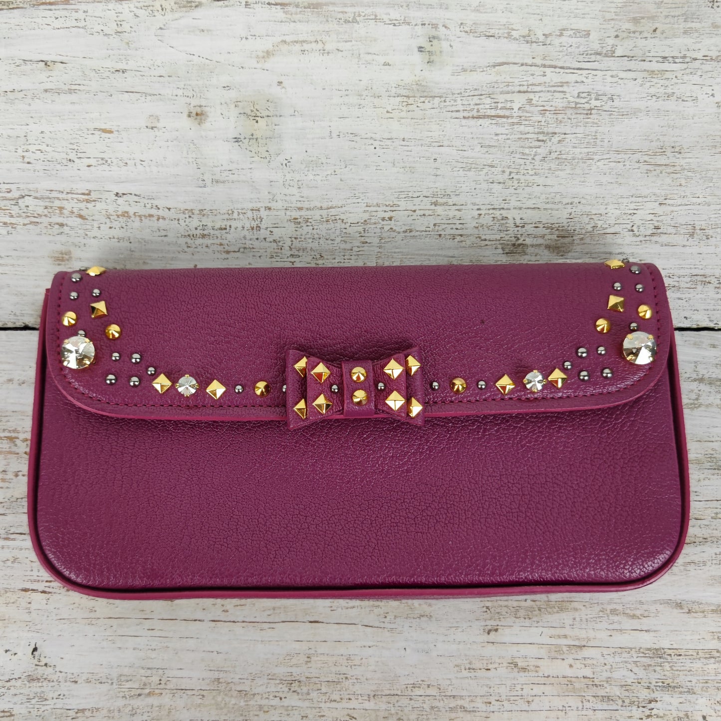 Pochette MiuMiu pelle ciclamino e strass