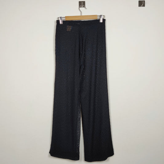 pantaloni neri traforati Romeo Gigli