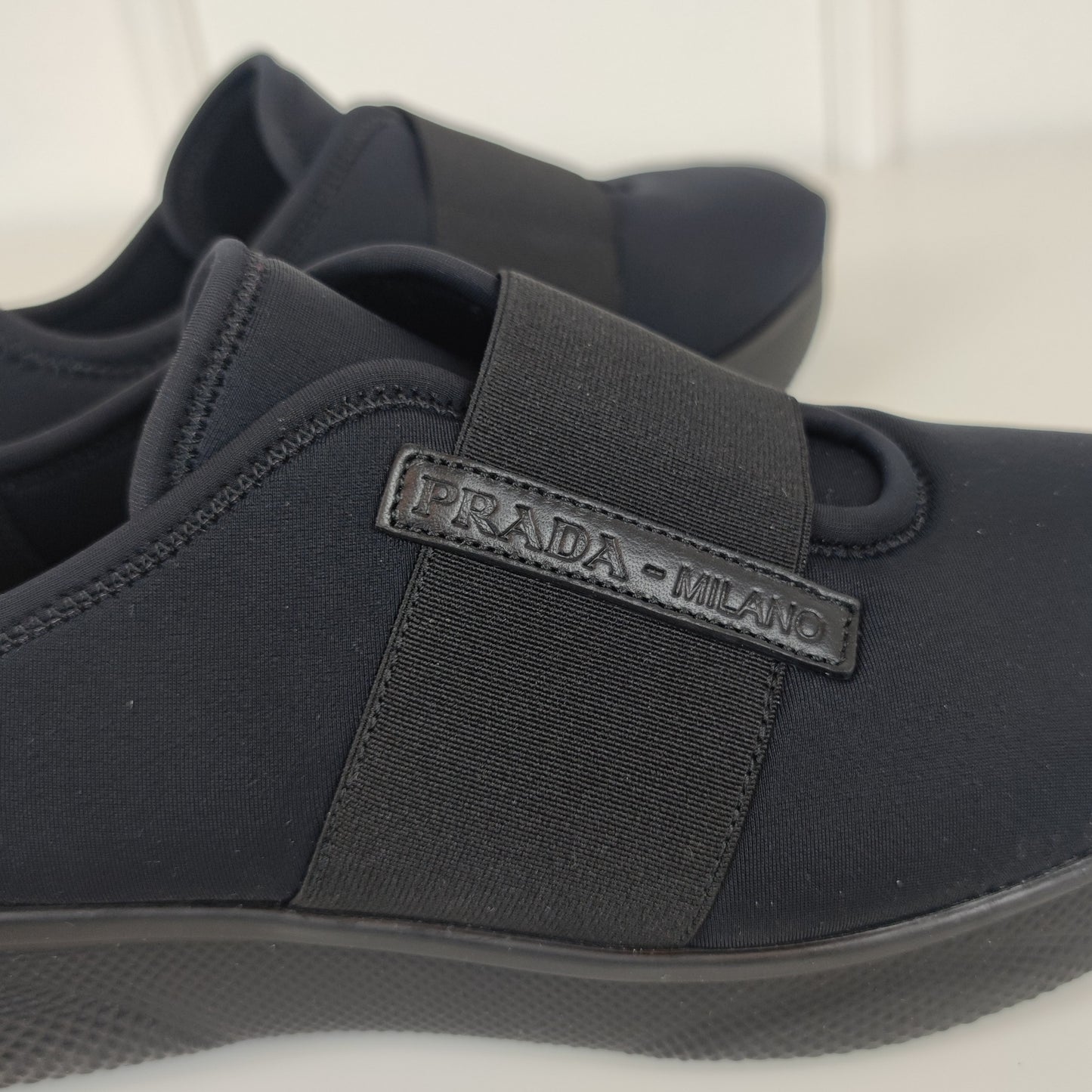 Sneakers Prada nere neoprene