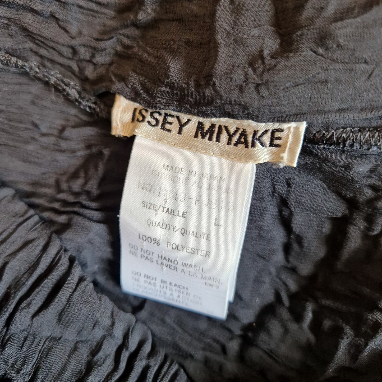 Completo Issey Miyake nero trasparente